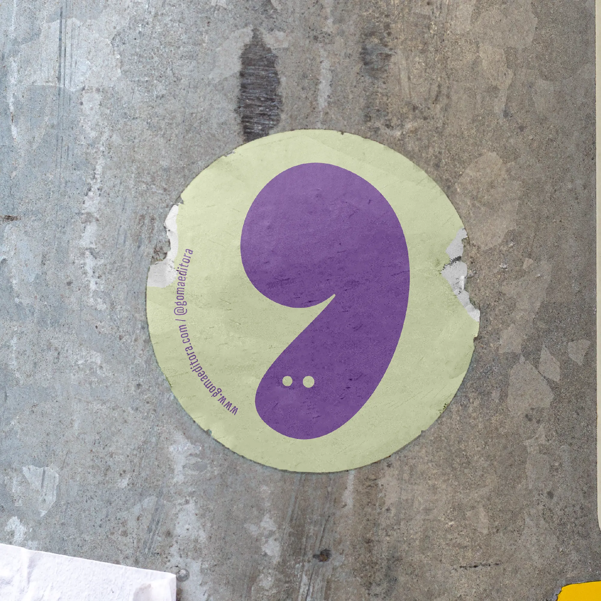 Round wall sticker with a purple Goma character shape.