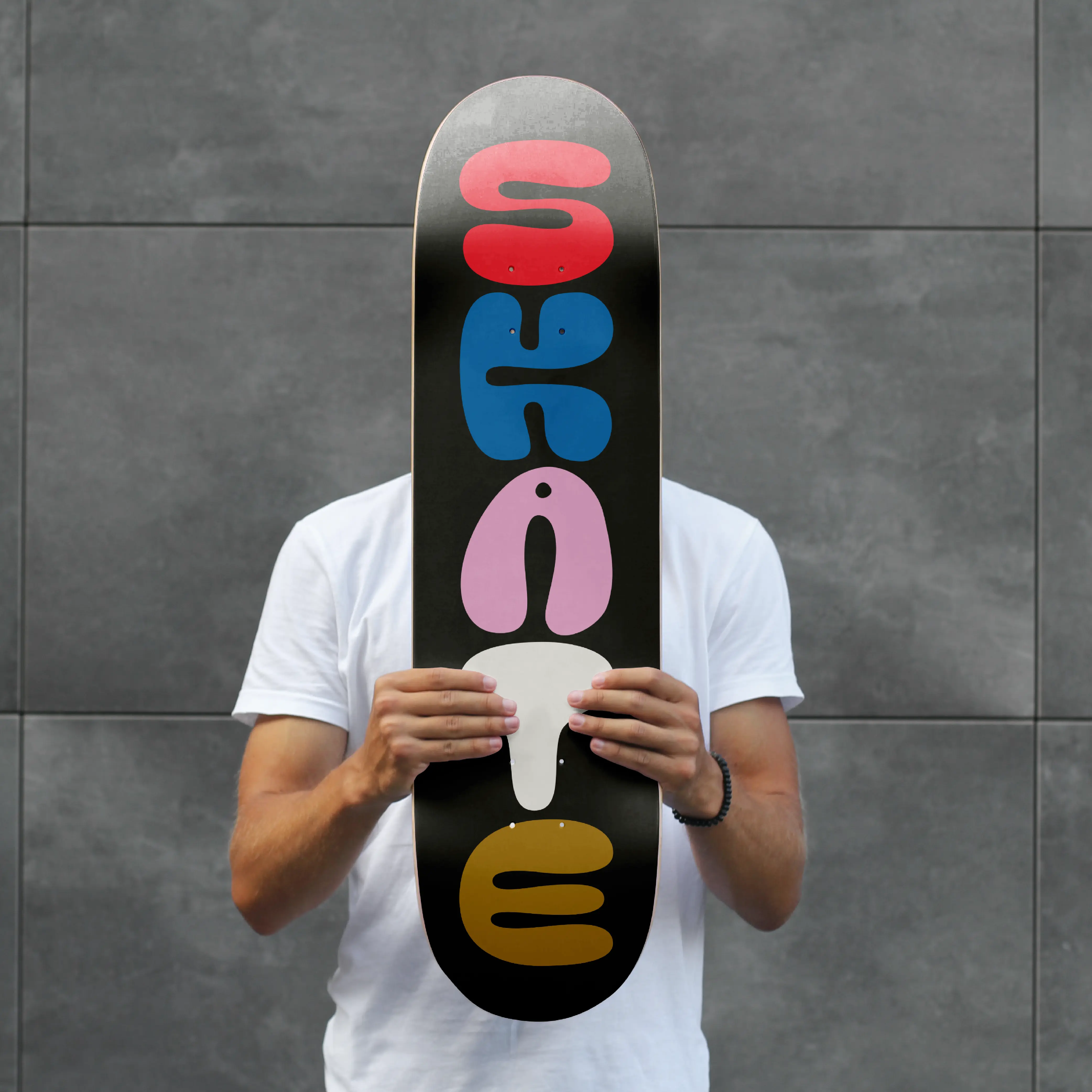 Person holding a vertical Brinca poster in front of their face.